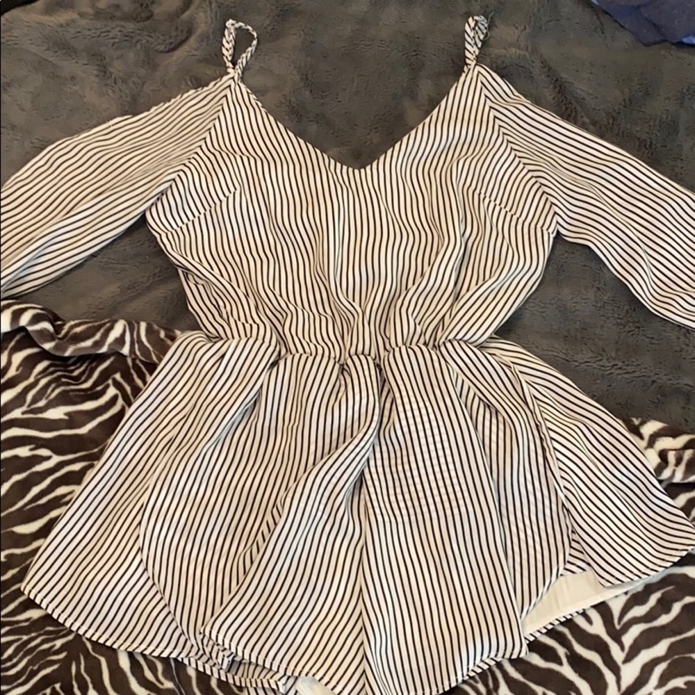 Romper. Size L